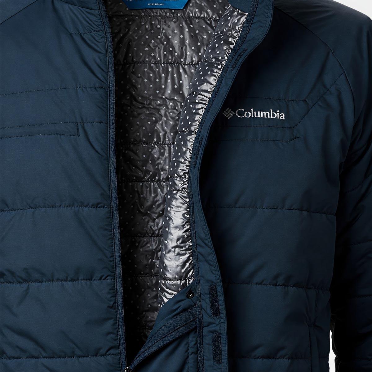 Close-up of a men's Columbia Omni-Heat jacket showcasing the thermal reflective lining.