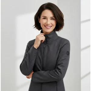 A smiling woman models a stylish women's heated jacket, showcasing its comfortable fit and modern design.