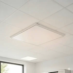 A sleek, low-profile radiant electric ceiling heating panel mounted on a ceiling, ideal for providing even warmth in an office or commercial space.