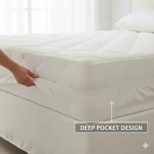 A mattress pad with deep pockets being fitted over a high-profile pillow-top mattress.