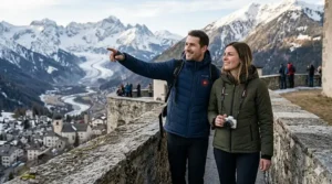 A photorealistic 4K photograph of a couple wearing USB powered heated jackets for travel while sightseeing in the snowy Alps.