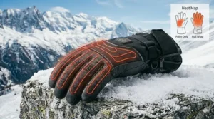 Close-up of the reinforced goat leather palm on a heated glove providing a secure grip on a ski pole.