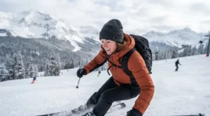 Athlete wearing a heated cap for winter during a cold-weather skiing trip.