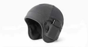 Rechargeable battery powered heated ski helmet liner on a white background