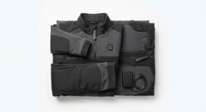 Folded heavy-duty battery heated body suit displayed flat on a white background