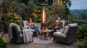 Wood pellet ambiance heating illuminated by the best outdoor pellet patio heater on a cool night.