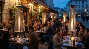 Multiple dyna-glo patio heater units keeping outdoor restaurant patrons warm during dinner.